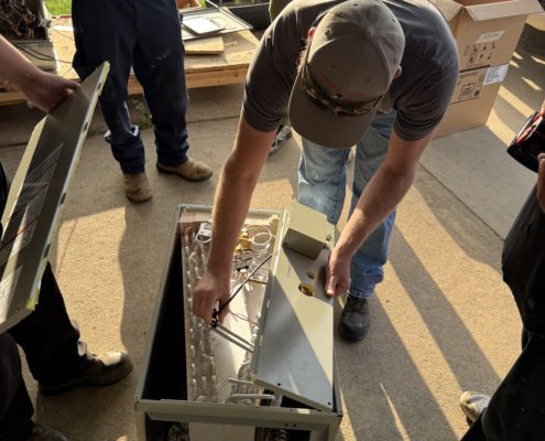 expert repairing an ac