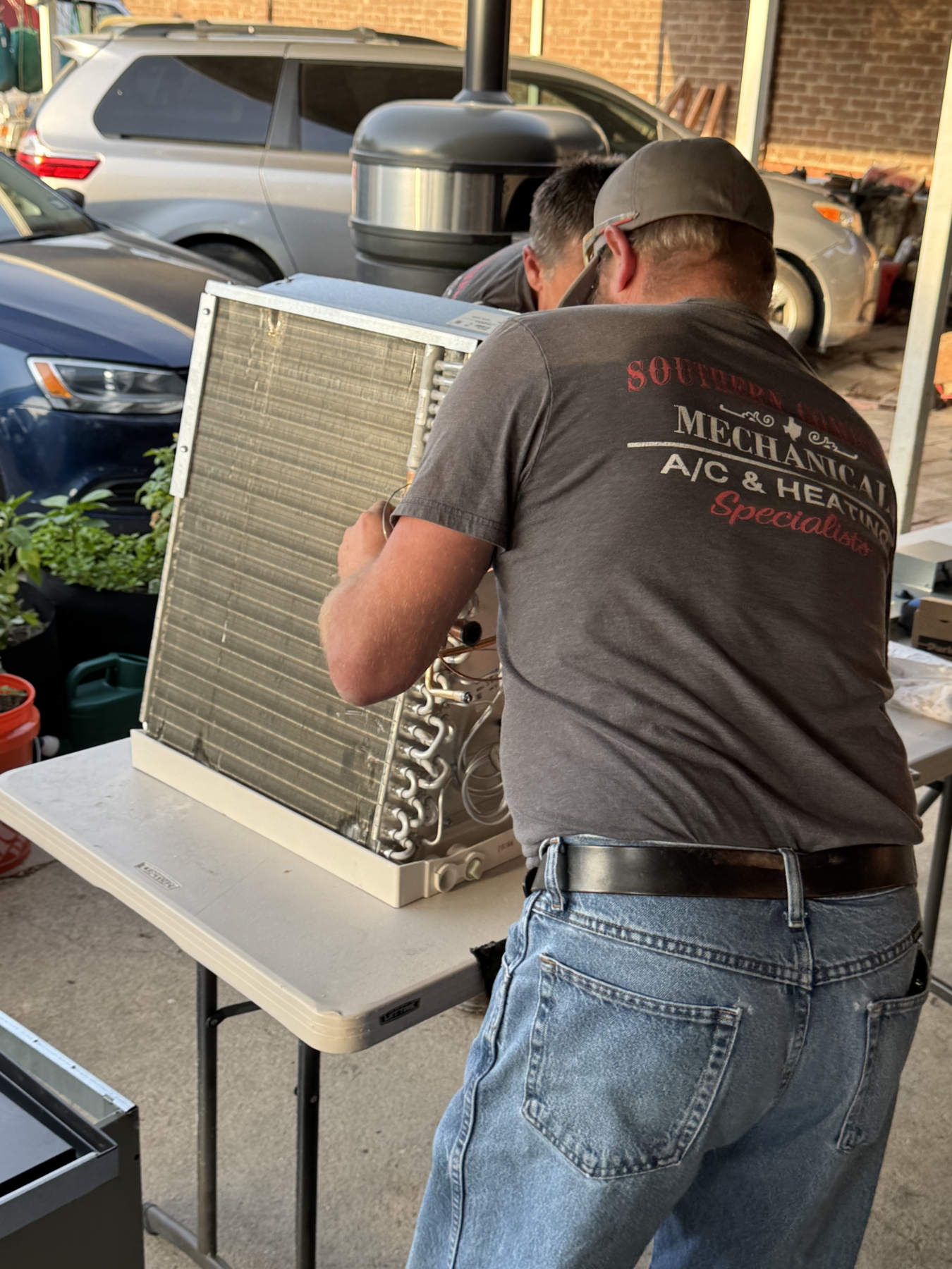technician doing ac repair